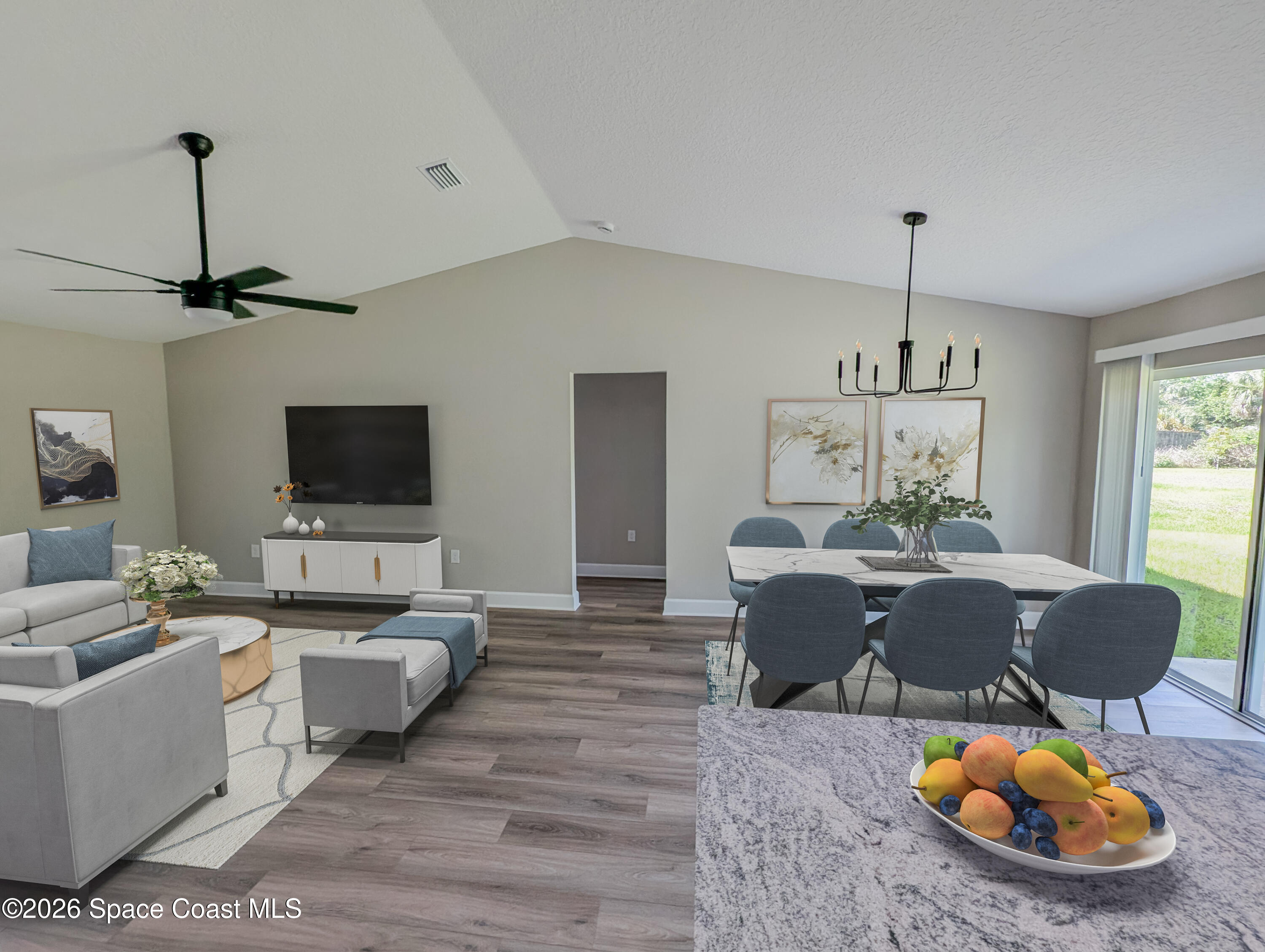 1356 Torgerson Road Southeast Palm Bay, FL 32909 - Photo 20 of 46 Living dining rooms with volume ceiling