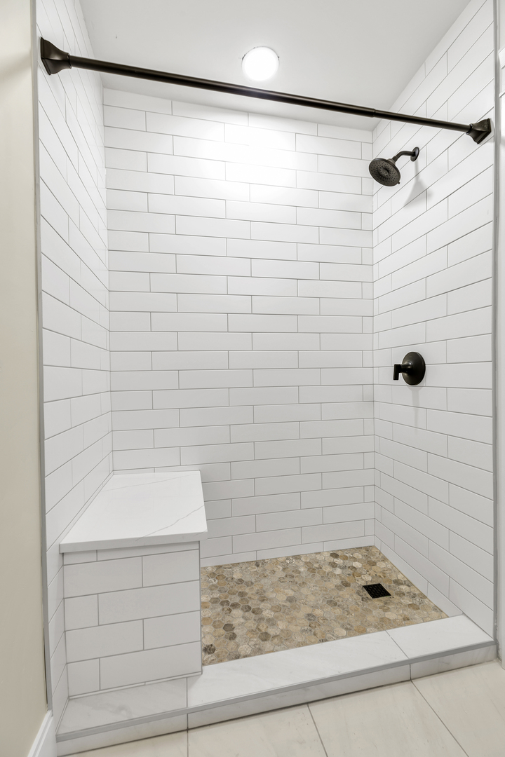 317 Canal Street, Unit B Lemont, IL 60439 - Photo 10 of 15 a bathroom with a shower