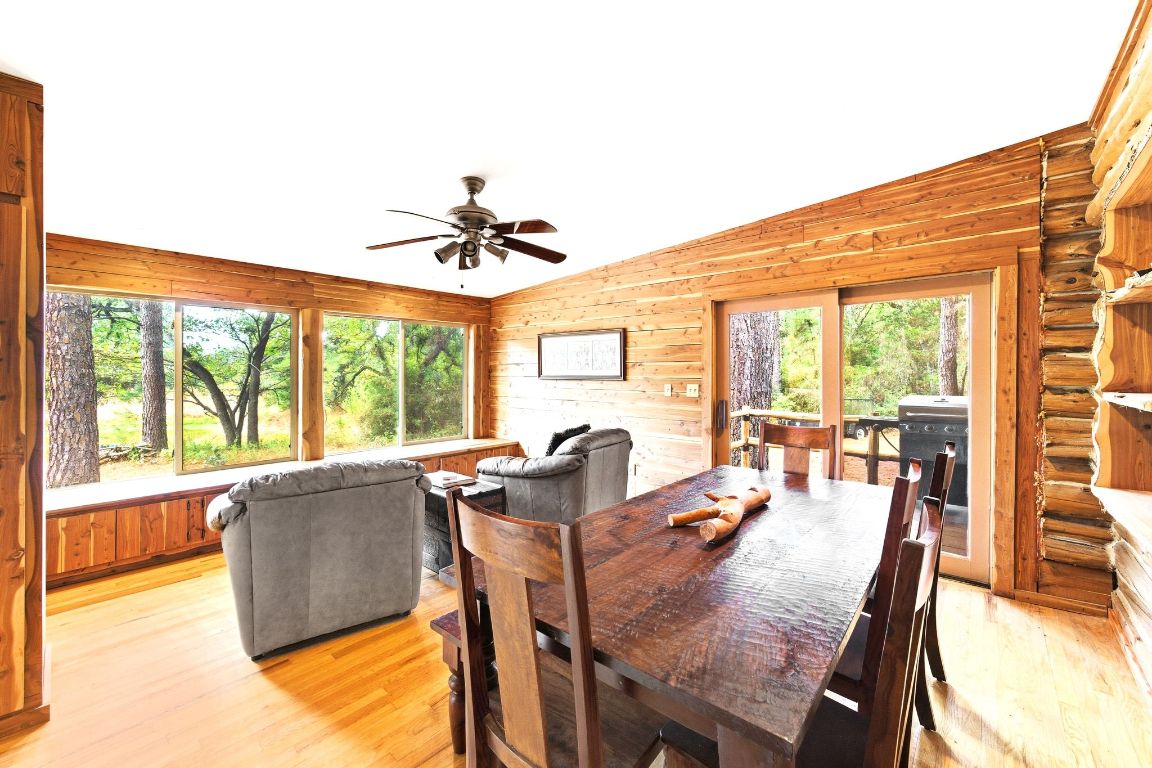 235 Antioch Road Paige, TX 78659 - Photo 12 of 40 a view of a dining room with furniture window and outside view