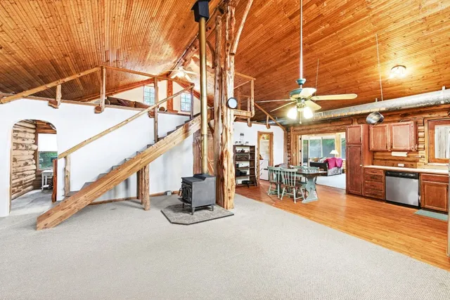 a view of a patio with table and chairs