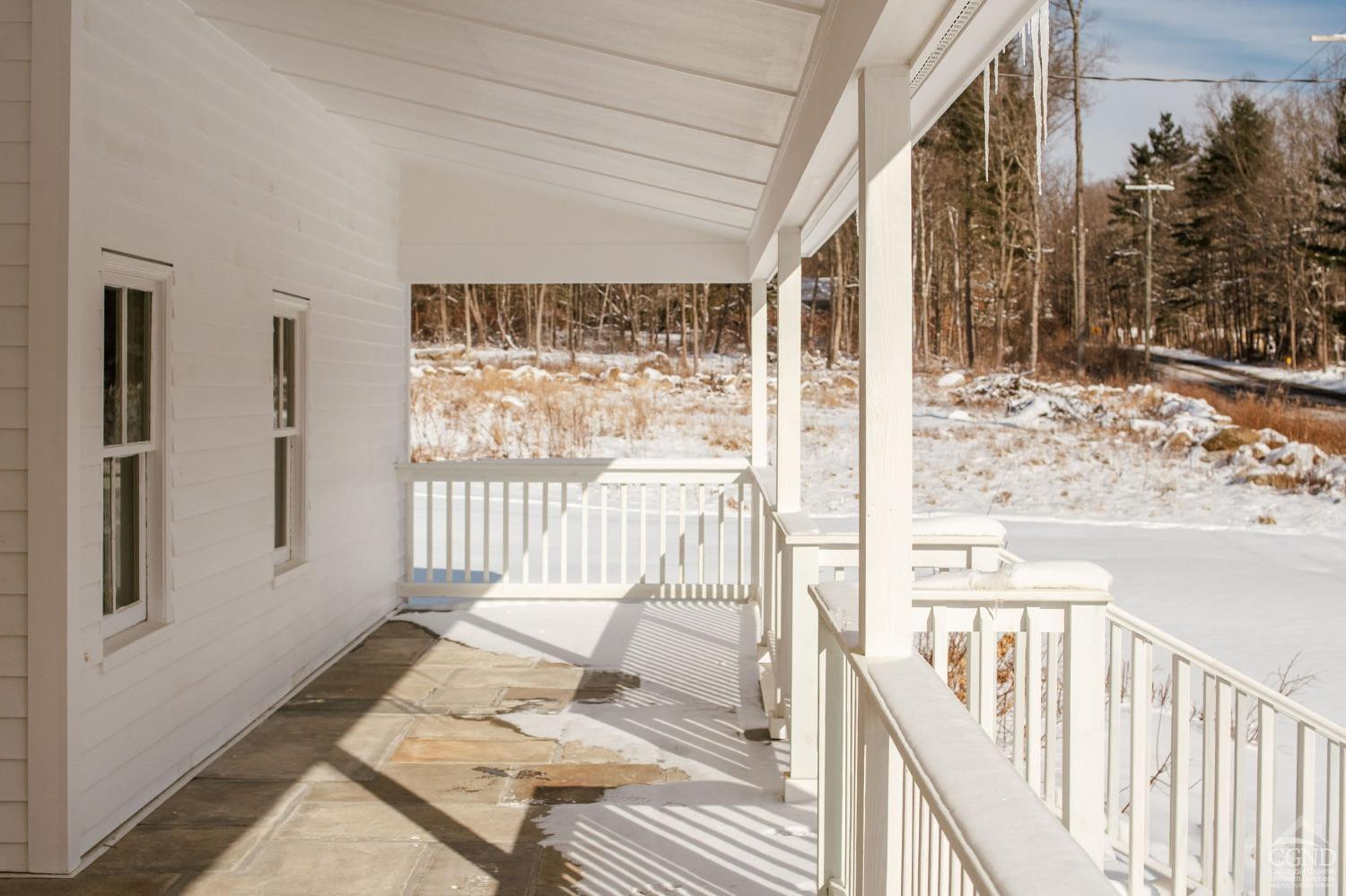 39 Great Hollow Road Cornwall, CT 06796 - Photo 4 of 32 a view of a balcony and wooden floor