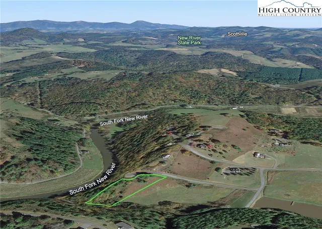 a view of swimming pool with a yard