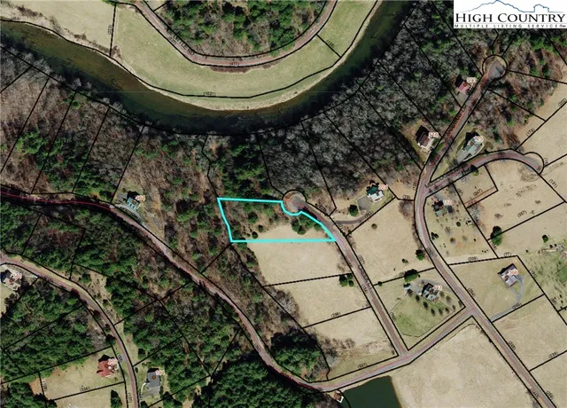 an aerial view of a highlighted house