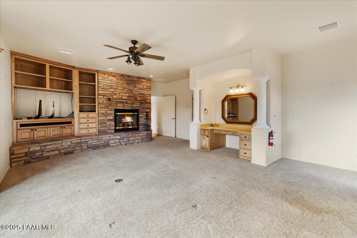 5540 Deer Spring Place Prescott, AZ 86305 - Photo 18 of 46 wooden floor & ceiling fan in a room