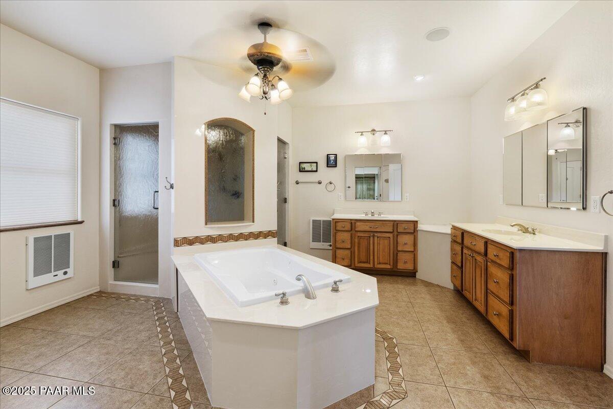 5540 Deer Spring Place Prescott, AZ 86305 - Photo 19 of 46 a spacious bathroom with a tub sink and mirror