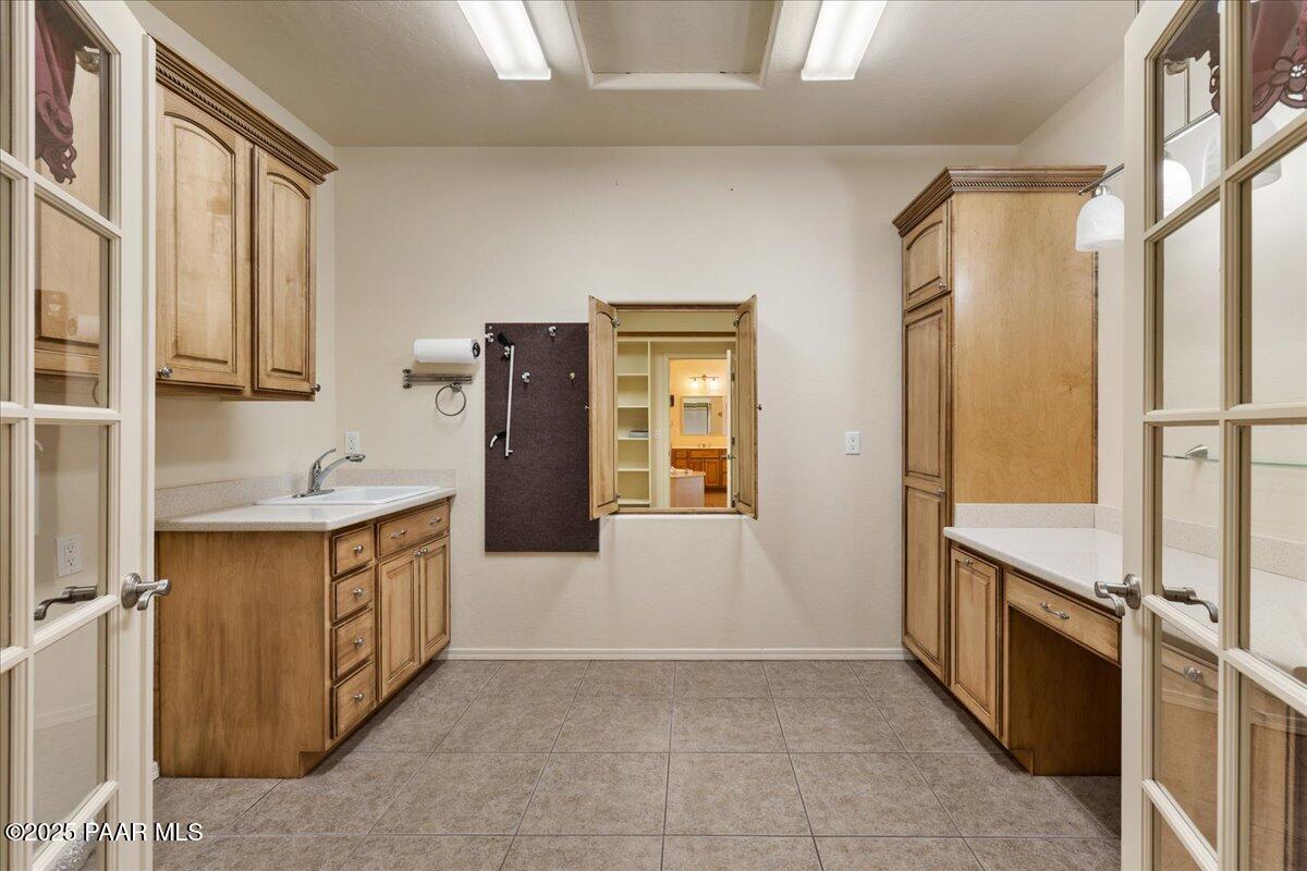 5540 Deer Spring Place Prescott, AZ 86305 - Photo 22 of 46 a view of a kitchen with a sink