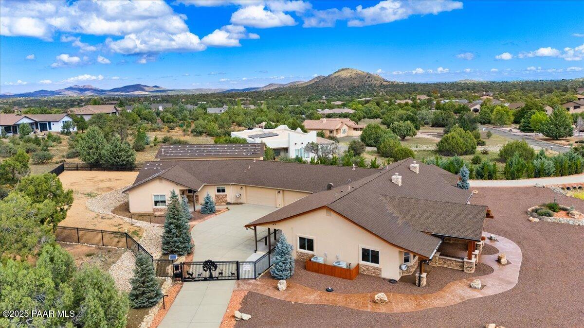 5540 Deer Spring Place Prescott, AZ 86305 - Photo 41 of 46 an aerial view of a house with a mountain view