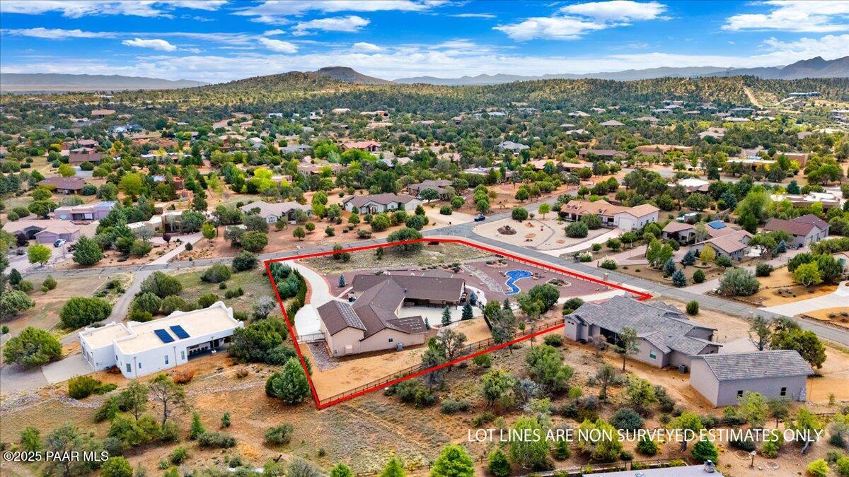 5540 Deer Spring Place Prescott, AZ 86305 - Photo 42 of 46 an aerial view of residential building with parking and city view