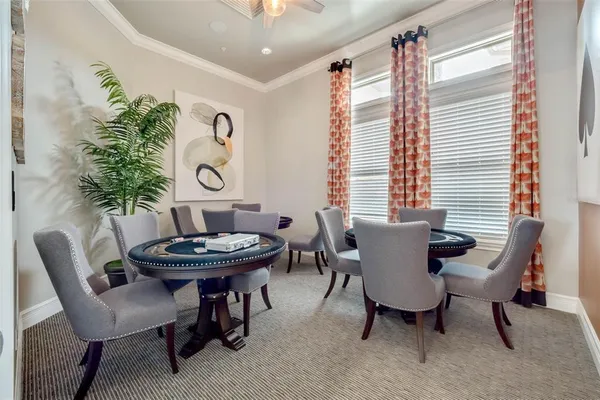an aerial view of a house with a garden and swimming pool