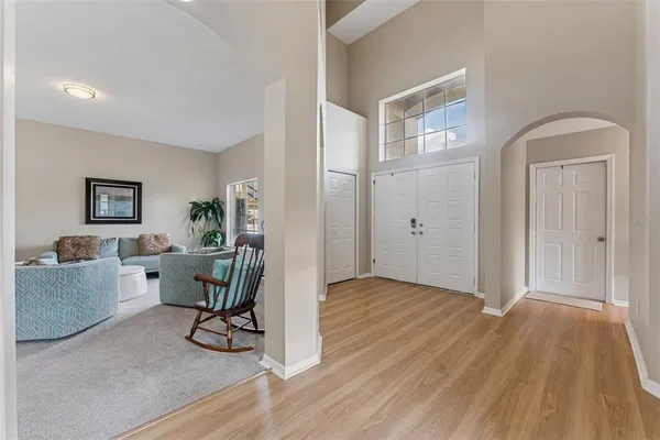 a view of livingroom with hardwood and furniture