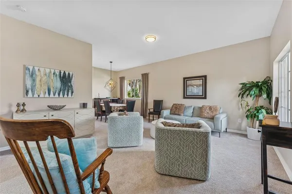a living room with furniture and a couch