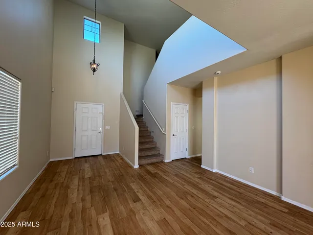 wooden floor in an empty room with a workspace