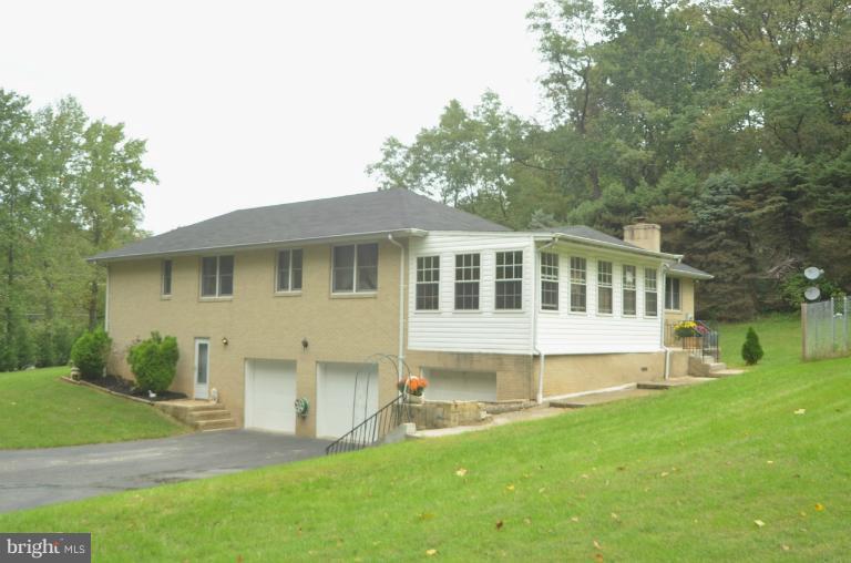 2111 Frederick Road Catonsville, MD 21228 - Photo 14 of 23 a view of a house with a yard and sitting area