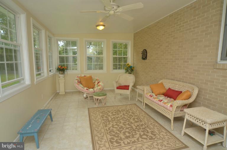 2111 Frederick Road Catonsville, MD 21228 - Photo 5 of 23 a living room with furniture and a rug