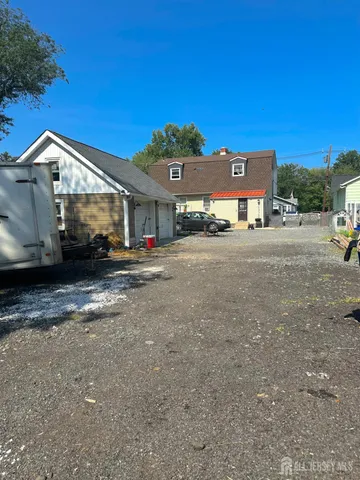 a view of a car parked on the side of the road