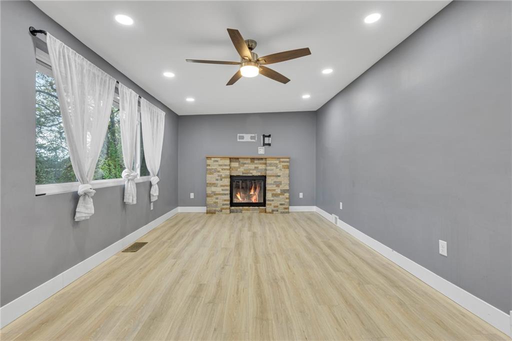 600 Neville Road Beaver, PA 15009 - Photo 11 of 23 a view of an empty room with a fireplace and a window