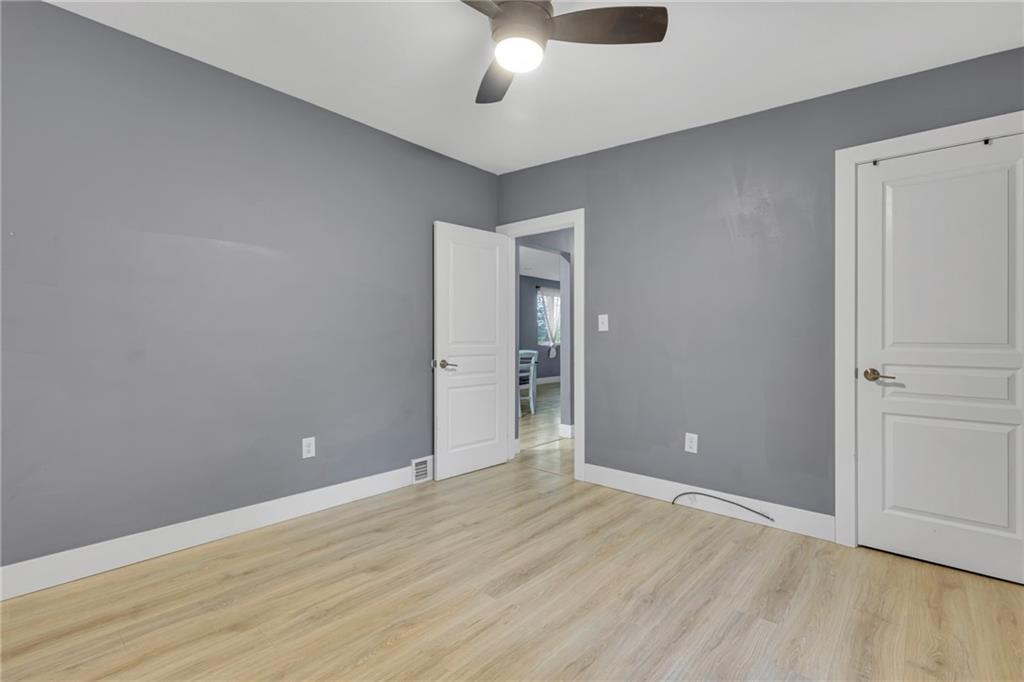 600 Neville Road Beaver, PA 15009 - Photo 14 of 23 a view of an empty room and wooden floor