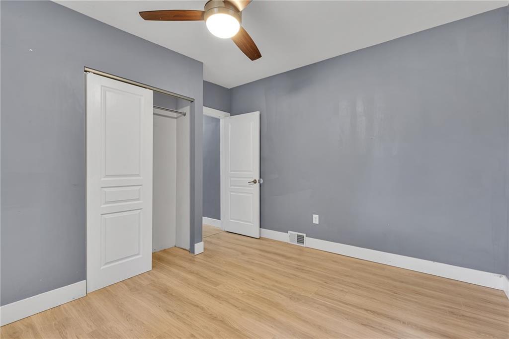 600 Neville Road Beaver, PA 15009 - Photo 16 of 23 a view of an empty room with wooden floor