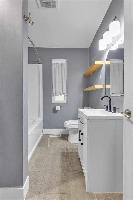 600 Neville Road Beaver, PA 15009 - Photo 18 of 23 a bathroom with a sink a toilet and a mirror