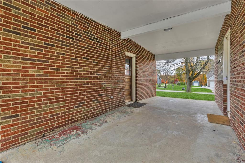 600 Neville Road Beaver, PA 15009 - Photo 2 of 23 a view of a house with a yard and garage