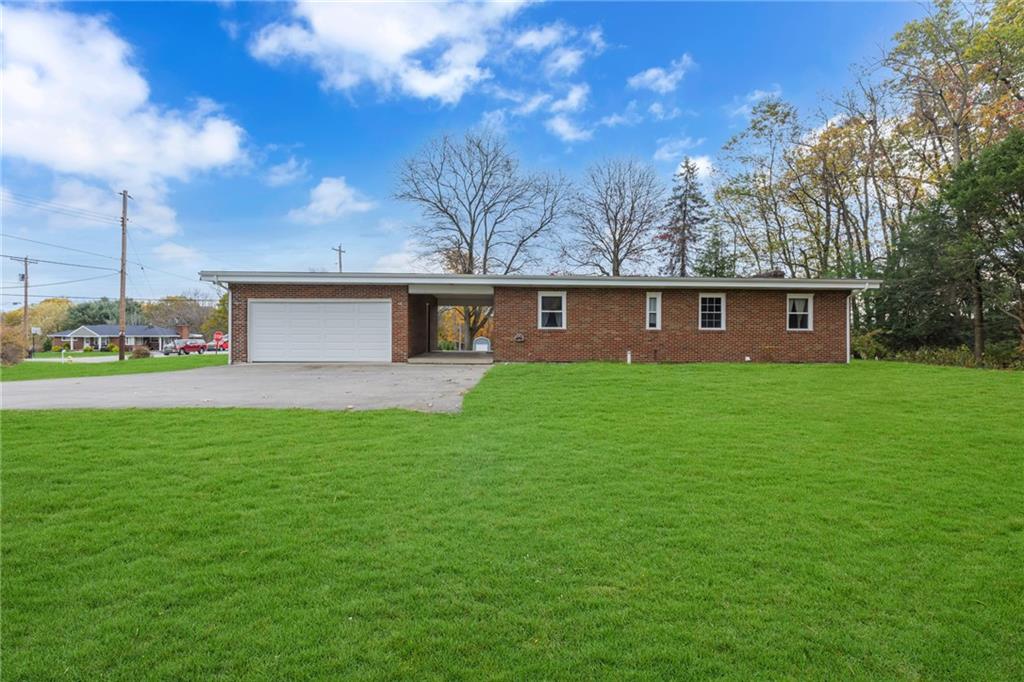 600 Neville Road Beaver, PA 15009 - Photo 22 of 23 a front view of house with a garden