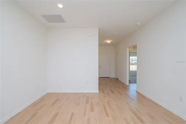 a kitchen with stainless steel appliances granite countertop a sink stove microwave and cabinets