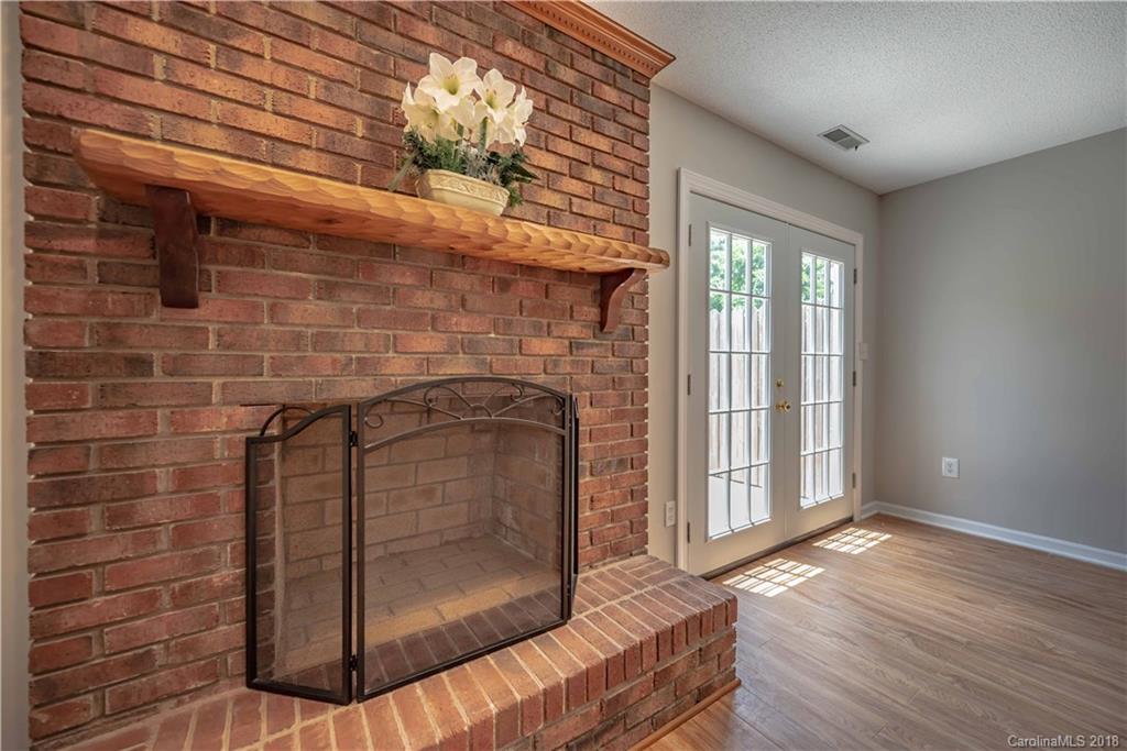 209 Eagle Road Belmont, NC 28012 - Photo 13 of 25 a living room with a wooden floor