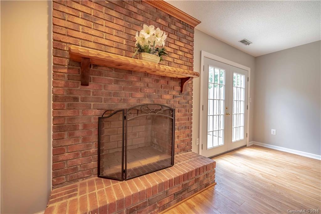 209 Eagle Road Belmont, NC 28012 - Photo 7 of 25 a living room with a fireplace