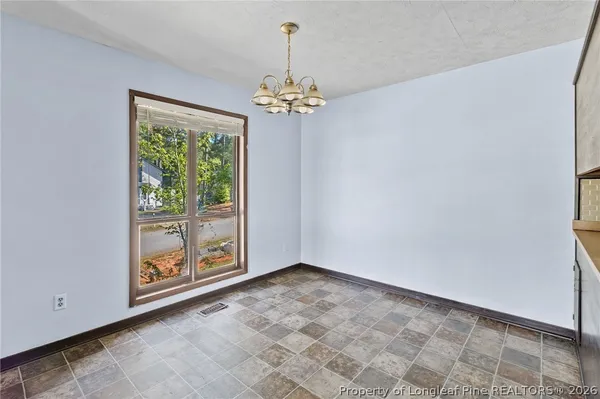 a view of an empty room with window
