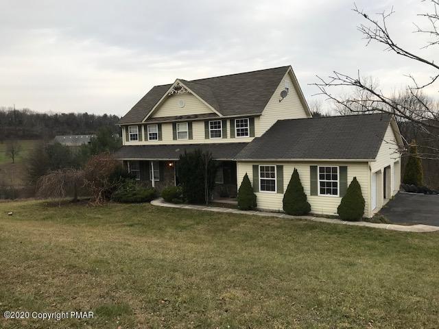 3504 Hill Run Road Effort, PA 18330 - Photo 1 of 22 a front view of a house with a yard