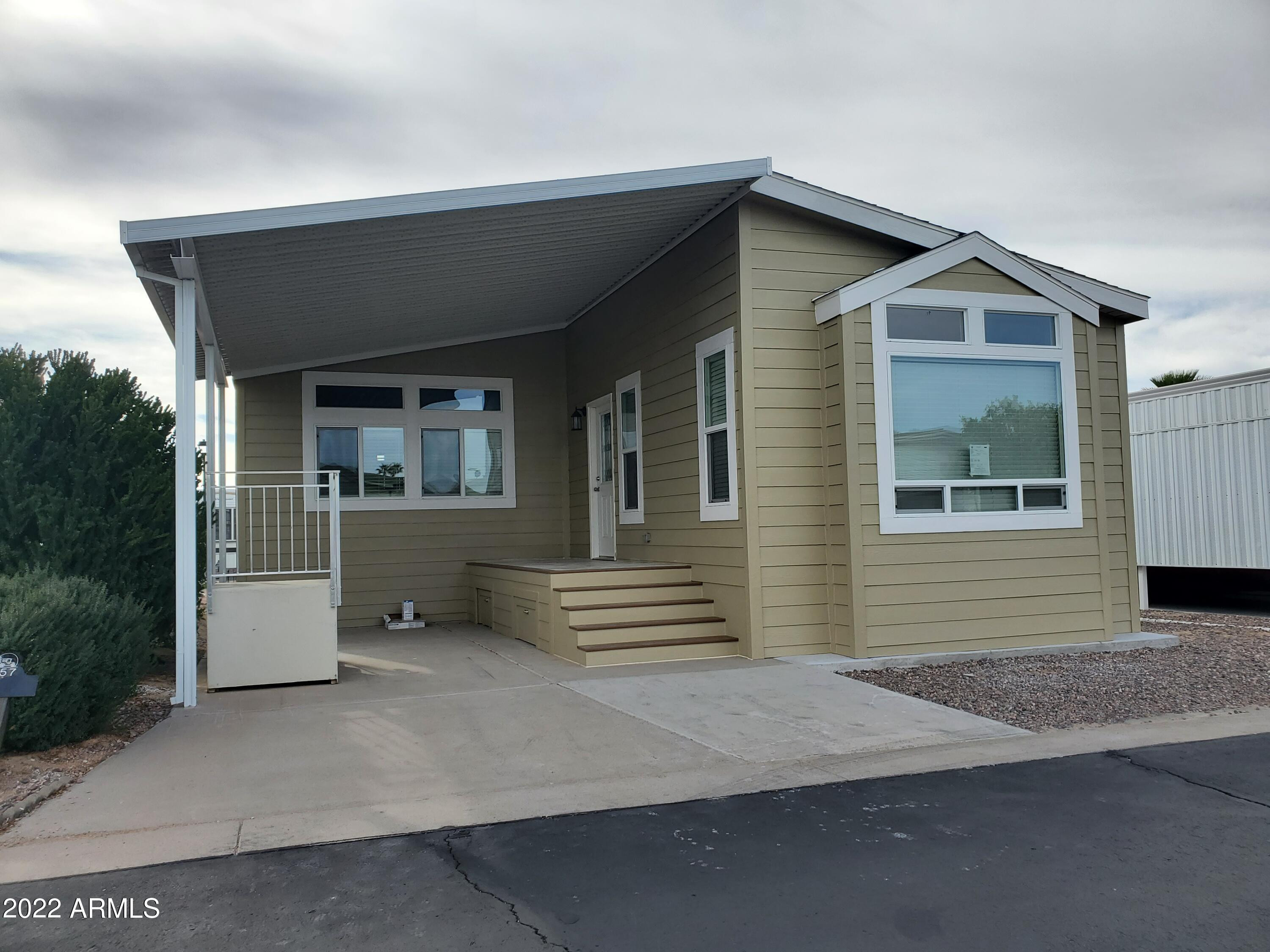 7750 East Broadway Road, Unit LOT 857 Mesa, AZ 85208 - Photo 12 of 17 a view of outdoor space yard and deck