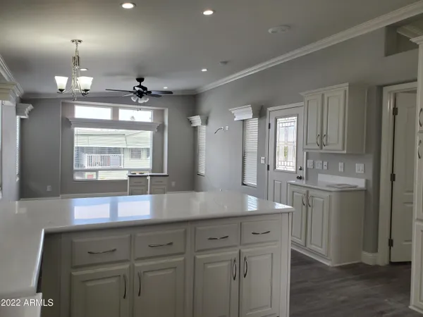a view of a granite countertop cabinets