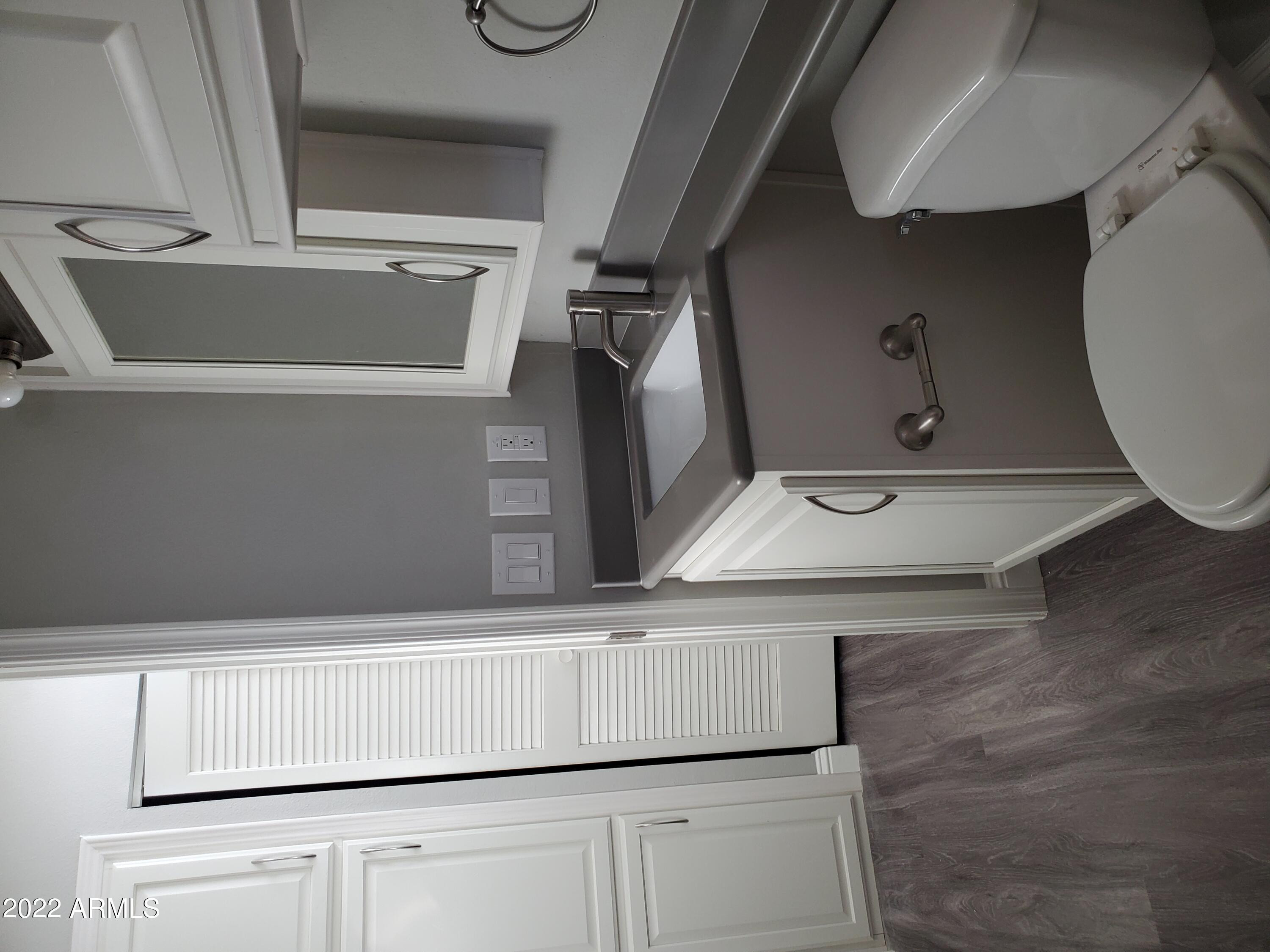 7750 East Broadway Road, Unit LOT 857 Mesa, AZ 85208 - Photo 9 of 17 a close view of laundry room with a washer and dryer