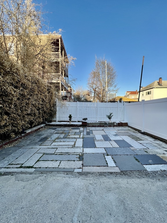 113 Moore Street, Unit 2 Boston, MA 02128 - Photo 16 of 19 a view of a yard