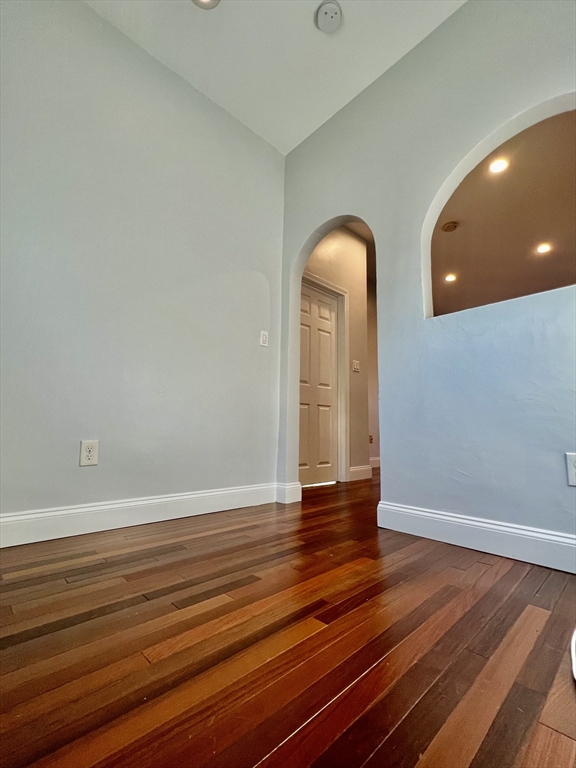 113 Moore Street, Unit 2 Boston, MA 02128 - Photo 19 of 19 a view of empty room with wooden floor