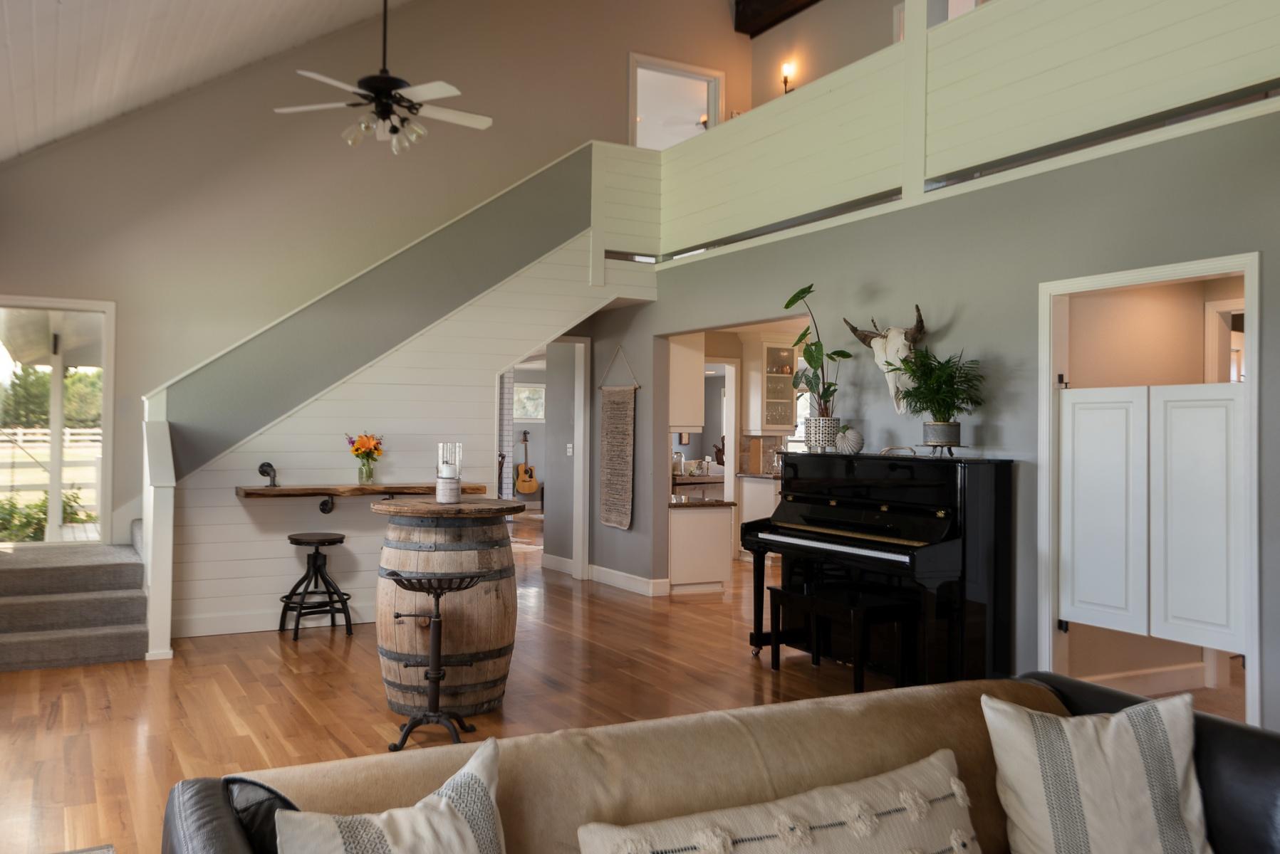 64495 Research Road Bend, OR 97703 - Photo 12 of 54 a living room with furniture and a wooden floor