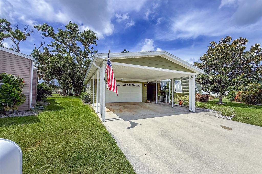 83 Eagle Circle Ellenton, FL 34222 - Photo 2 of 60 front view of a house with a yard