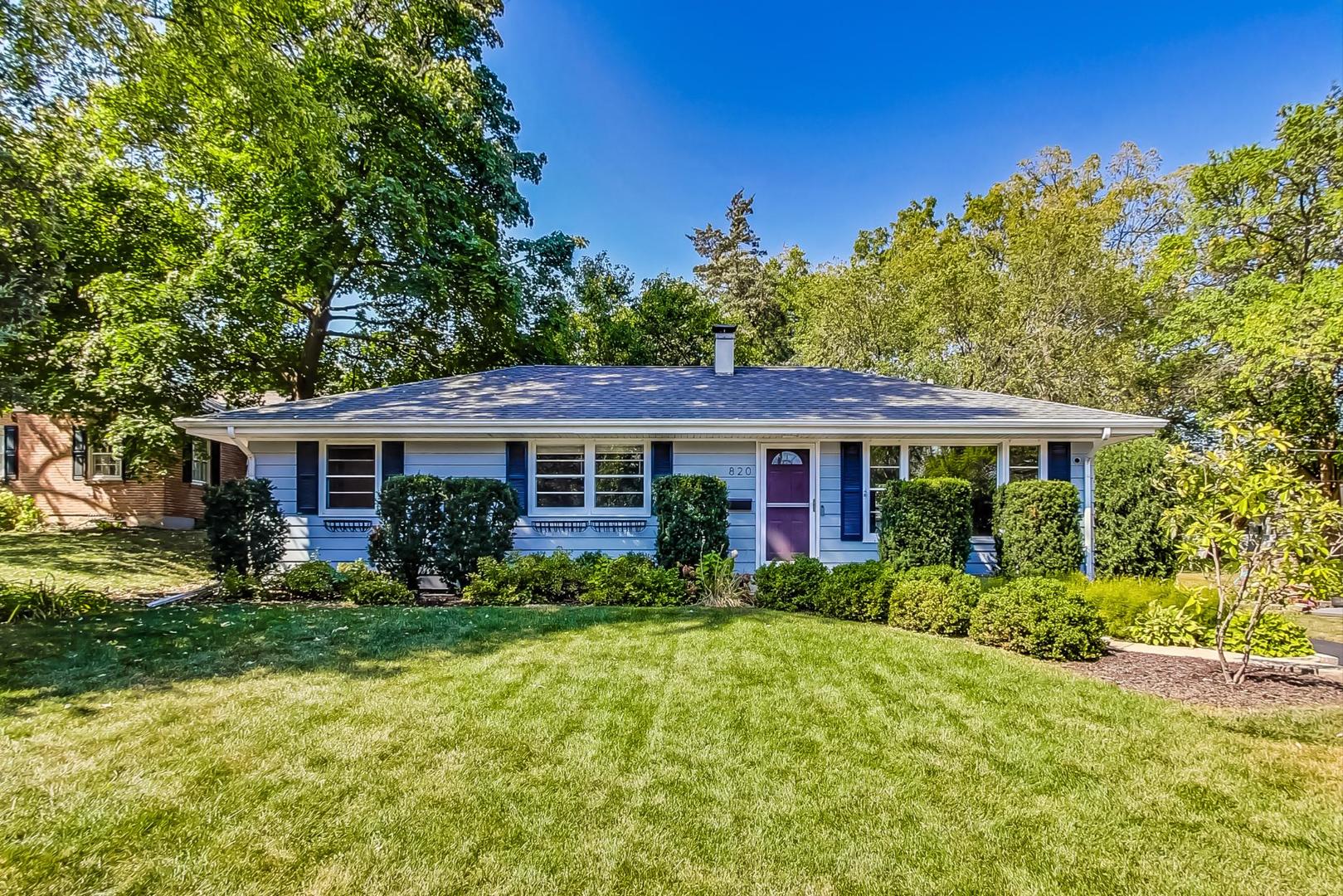820 Sunset Road Wheaton, IL 60189 - Photo 1 of 32 a view of a house with garden