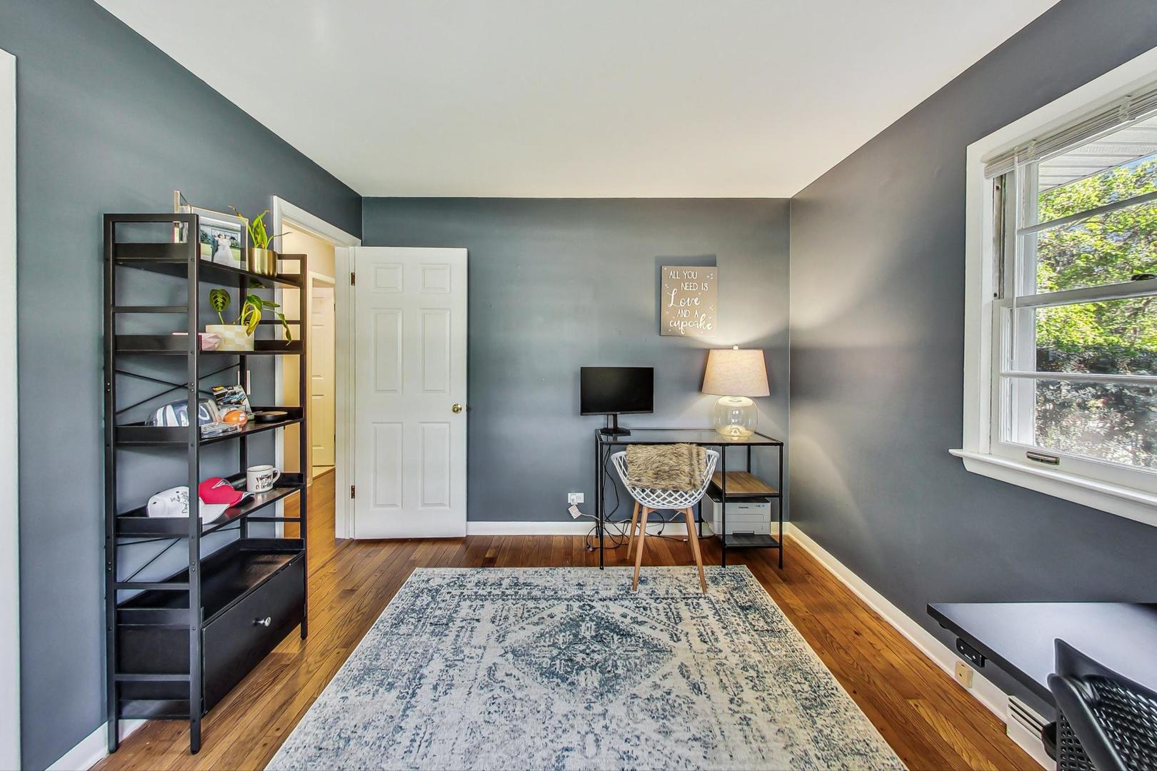 820 Sunset Road Wheaton, IL 60189 - Photo 15 of 32 a living room with furniture and a window