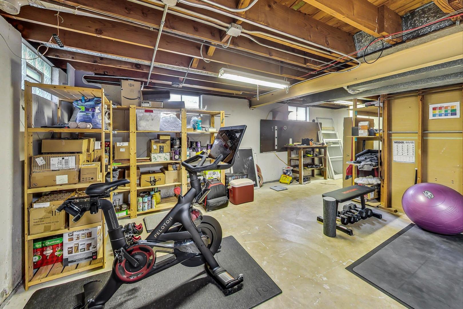 820 Sunset Road Wheaton, IL 60189 - Photo 23 of 32 a view of a room with gym equipment