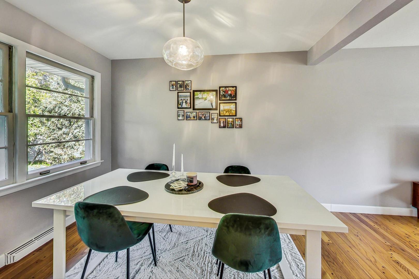 820 Sunset Road Wheaton, IL 60189 - Photo 5 of 32 a view of a dining room with furniture and wooden floor