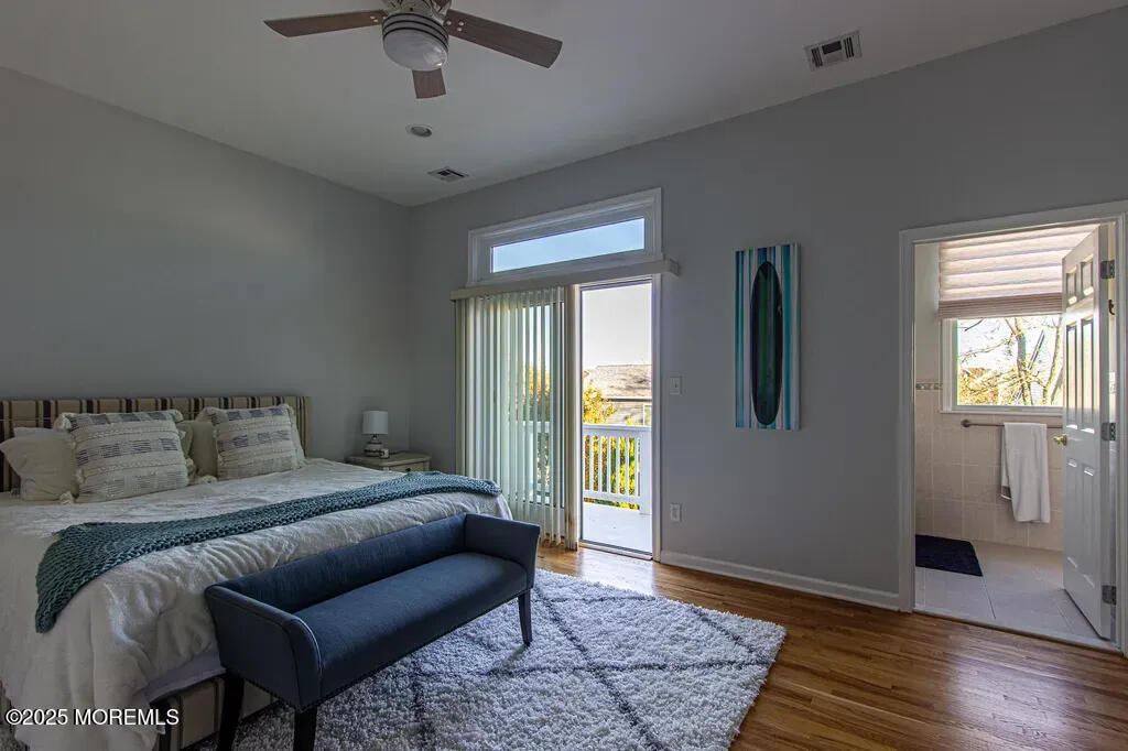 303 Highway 35, Unit 1 Point Pleasant Beach, NJ 08742 - Photo 19 of 25 a bedroom with a bed and a window