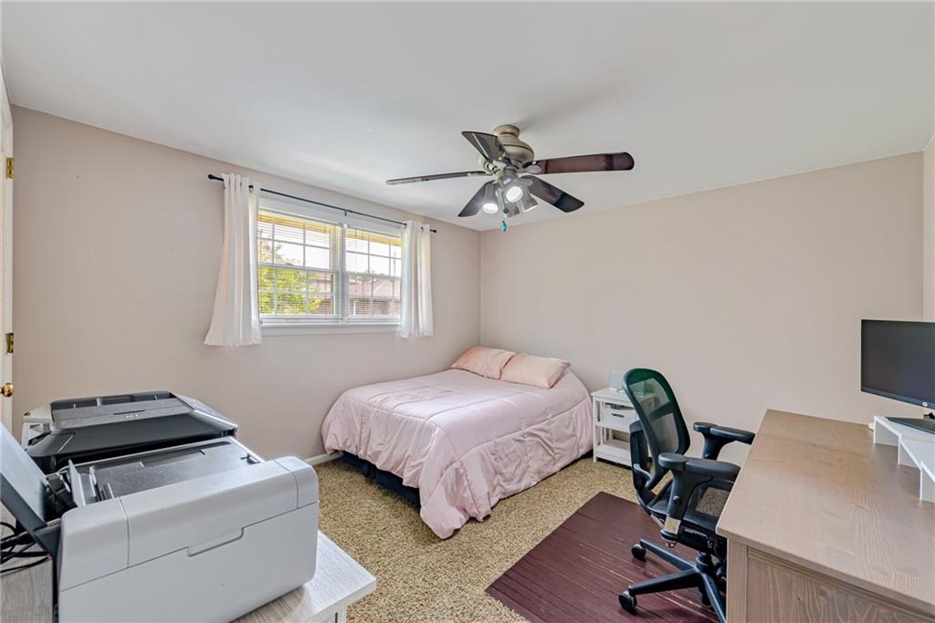 905 Lombard Street Irwin, PA 15642 - Photo 23 of 30 a bedroom with a bed and a window