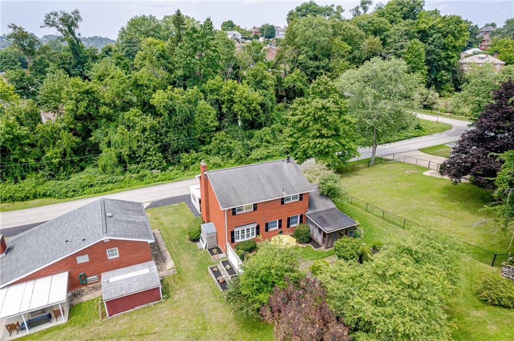 905 Lombard Street Irwin, PA 15642 - Photo 28 of 30 an aerial view of a house with garden space and street view