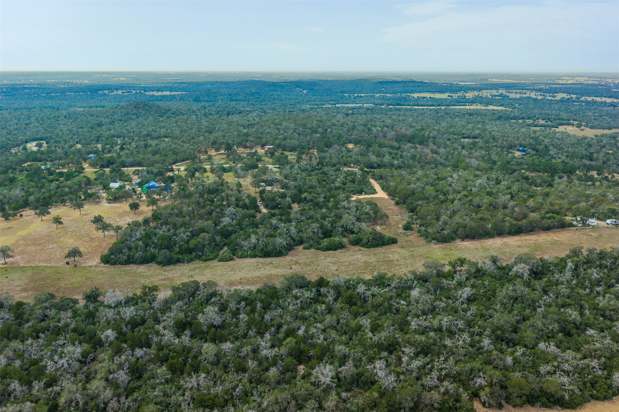 3301 Chuckwagon Road Harwood, TX 78632 - Photo 23 of 36 Mature woodlands and open clearings define this vast natural acreage.
