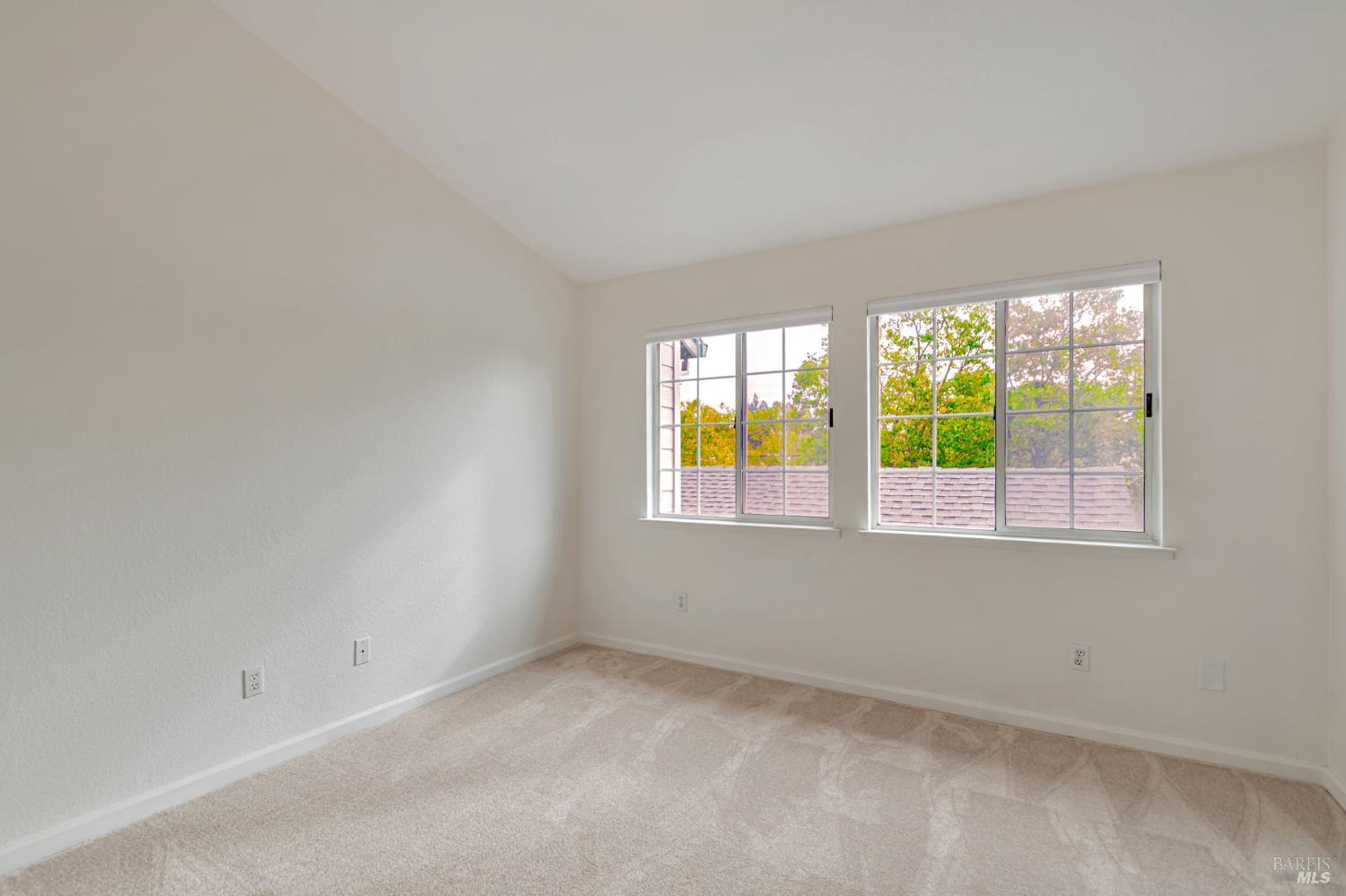 1239 Eardley Avenue Santa Rosa, CA 95401 - Photo 15 of 25 an empty room with windows