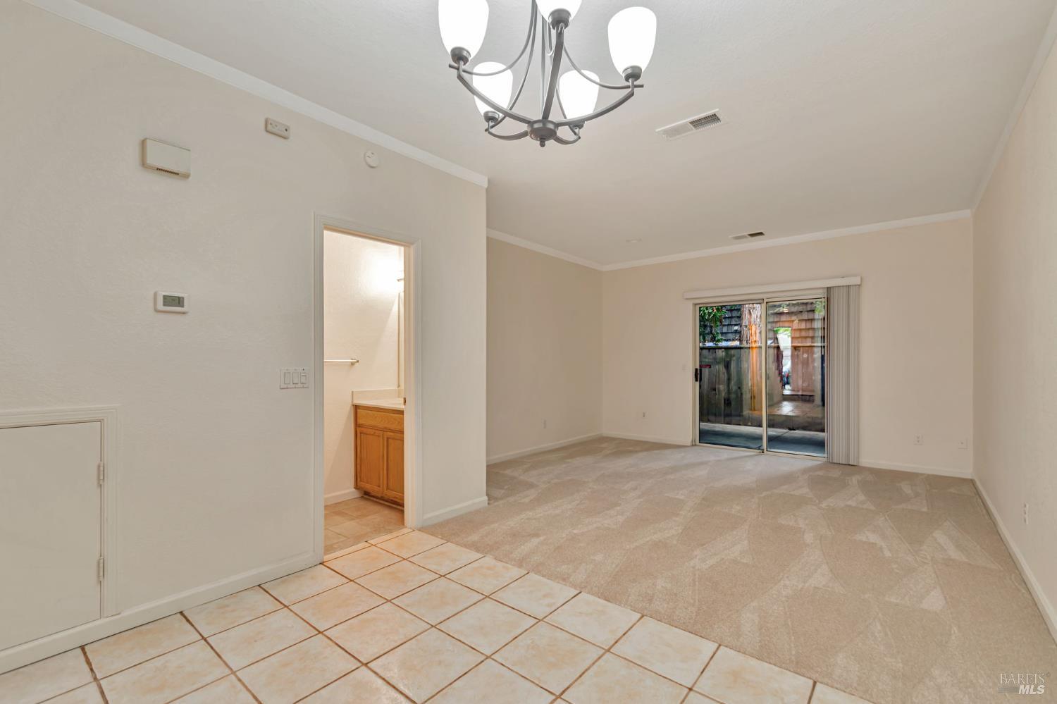 1239 Eardley Avenue Santa Rosa, CA 95401 - Photo 4 of 25 a view of empty room with chandelier