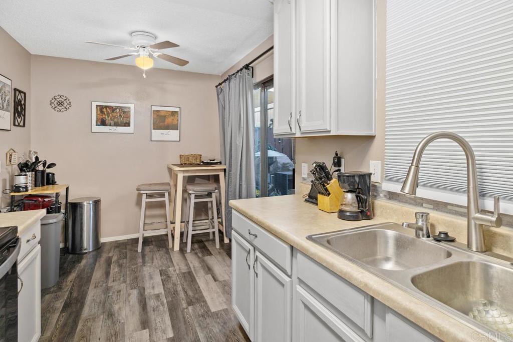 12553 Mapleview Street, Unit 28 Lakeside, CA 92040 - Photo 12 of 26 a kitchen with a sink cabinets and appliances