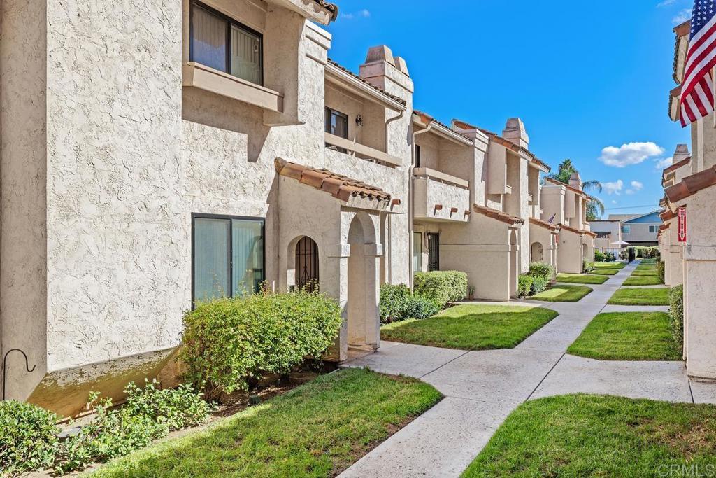 12553 Mapleview Street, Unit 28 Lakeside, CA 92040 - Photo 2 of 26 a front view of a house with a yard