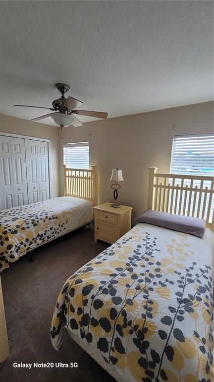 1040 Marcello Boulevard Kissimmee, FL 34746 - Photo 11 of 24 a bedroom with a bed and a dresser